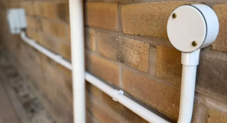 External Socket Installation in Banbury – Neat White Conduit Installation